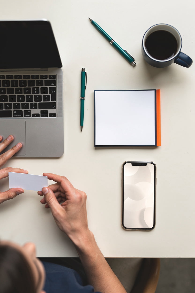 Growth clear website pricing for small businesses in Orange, CA, shown with a notepad and laptop on a desk